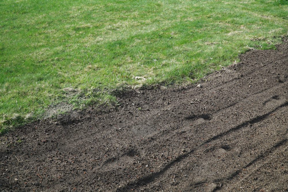 adding topsoil to existing lawn